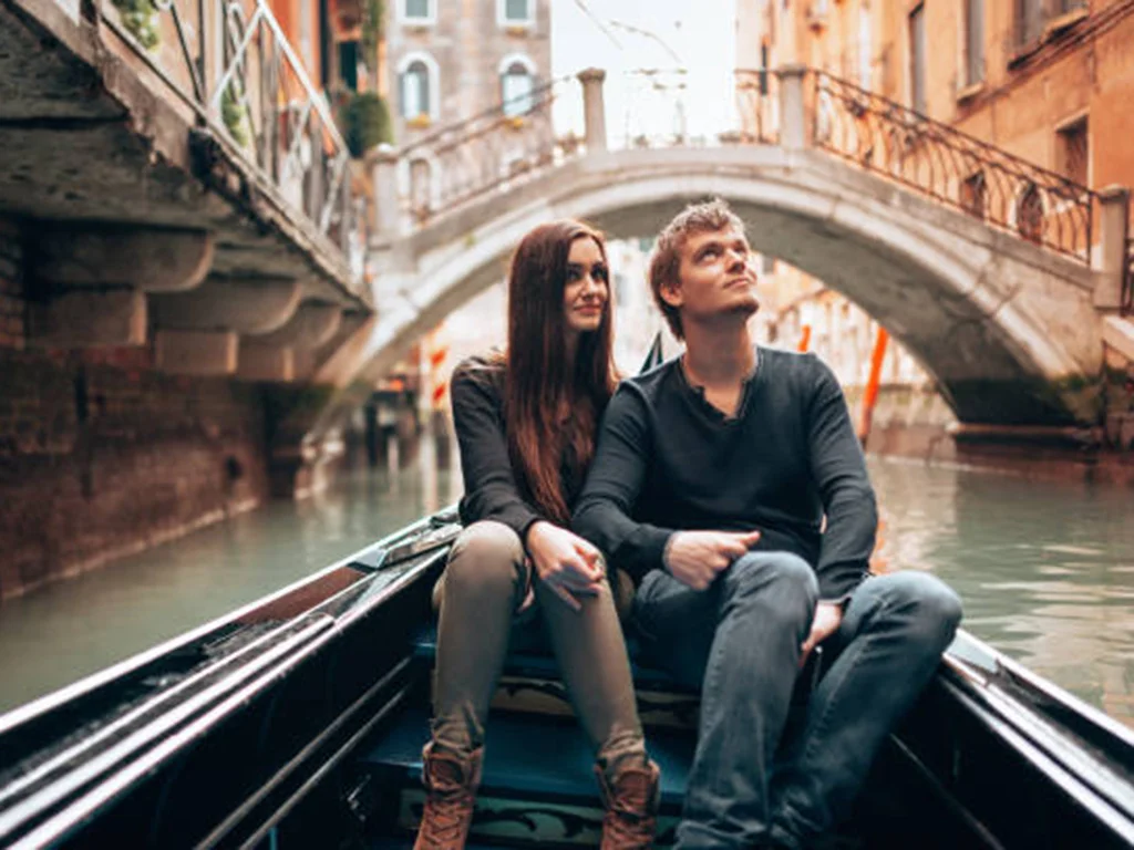 tourist together in the gondola in venezia